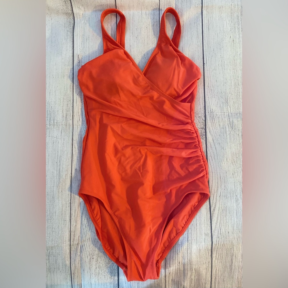 Kirkland brand: Pretty Orange Swimsuit. Good condition. US 10